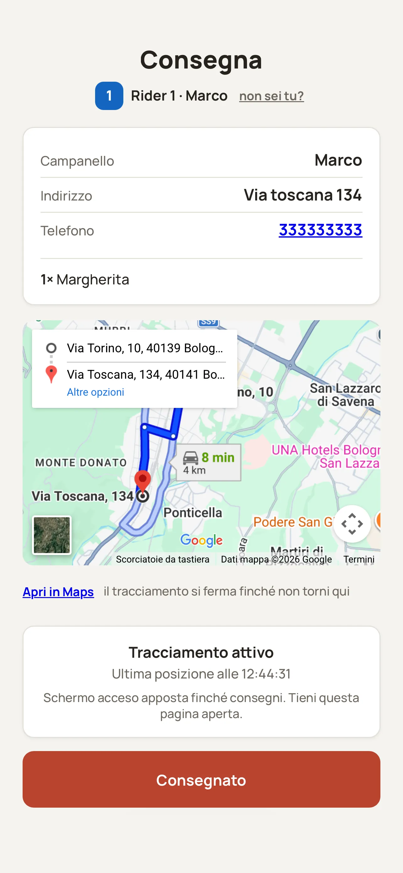 Il telefono del rider dopo il QR: l’indirizzo della consegna, il percorso e il tracciamento attivo.